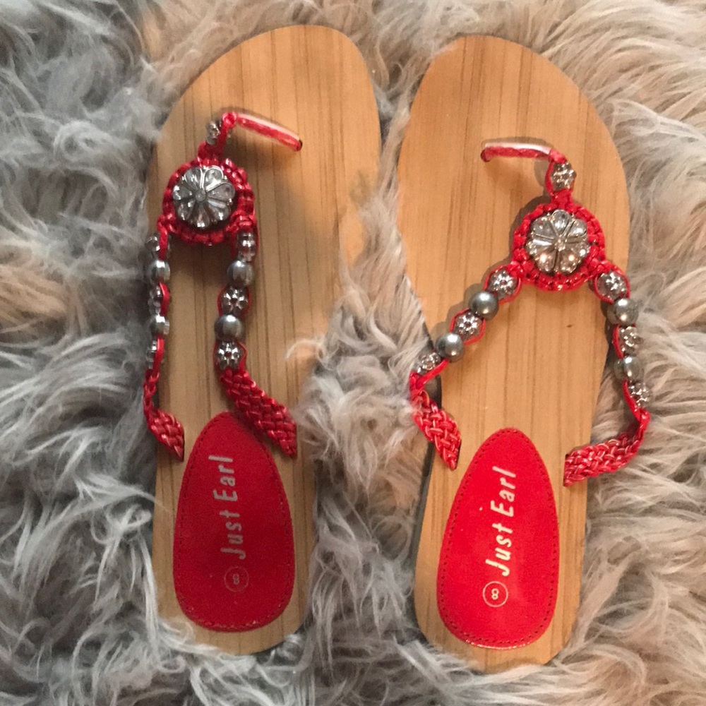 Red slip on Sandals w/ rhinestones. Never used